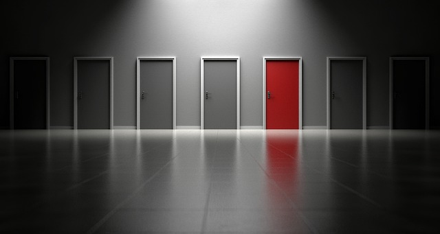 Photo includes doors, representing choices