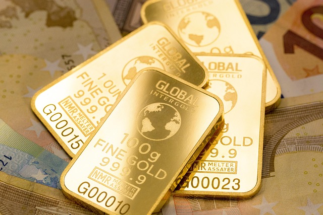 gold bars pictured with other money