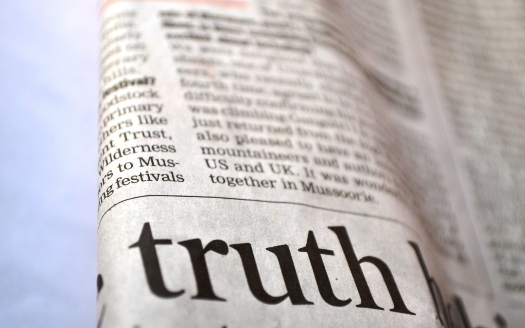 newspaper with headline "Truth"